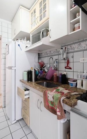 Casa à venda com 58m², 3 quartos e 1 vagaCozinha e Área de Serviço
