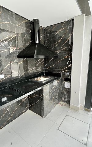 Casa à venda com 140m², 4 quartos e 2 vagas Casa à venda com 140m², 4 quartos e 2 vagasGaragem / Churrasqueira