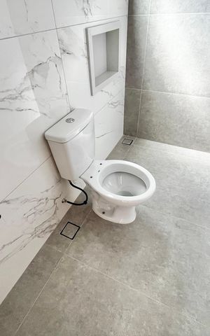 Casa à venda com 140m², 4 quartos e 2 vagas Casa à venda com 140m², 4 quartos e 2 vagasBanheiro da Suíte 3