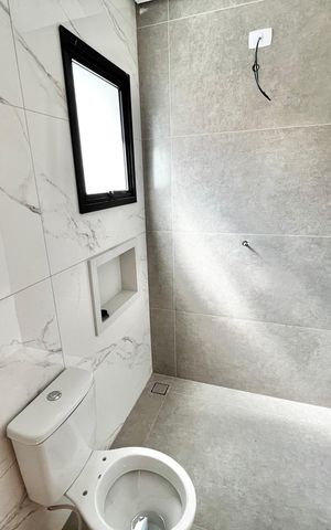 Casa à venda com 140m², 4 quartos e 2 vagas Casa à venda com 140m², 4 quartos e 2 vagasBanheiro da Suíte 1