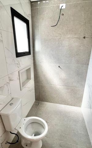 Casa à venda com 140m², 4 quartos e 2 vagas Casa à venda com 140m², 4 quartos e 2 vagasBanheiro da Suíte 3