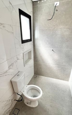Casa à venda com 140m², 4 quartos e 2 vagas Casa à venda com 140m², 4 quartos e 2 vagasBanheiro da Suíte 3
