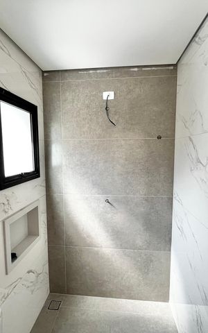 Casa à venda com 140m², 4 quartos e 2 vagas Casa à venda com 140m², 4 quartos e 2 vagasBanheiro da Suíte 1