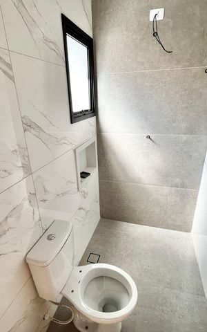 Casa à venda com 140m², 4 quartos e 2 vagas Casa à venda com 140m², 4 quartos e 2 vagasBanheiro da Suíte 2