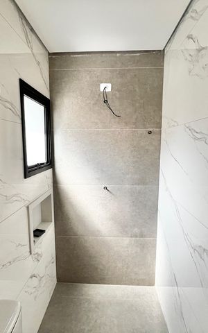 Casa à venda com 140m², 4 quartos e 2 vagas Casa à venda com 140m², 4 quartos e 2 vagasBanheiro da Suíte 2