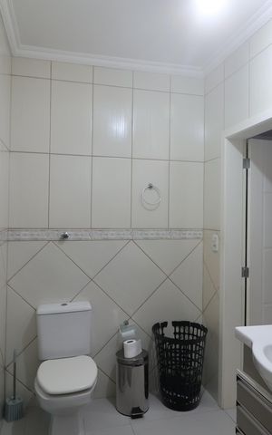 Casa à venda com 180m², 4 quartos e 3 vagasBanheiro da Suíte 1