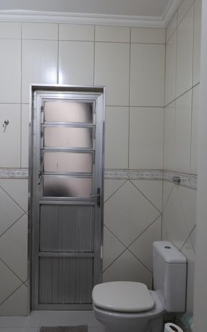 Casa à venda com 180m², 4 quartos e 3 vagasBanheiro da Suíte 1