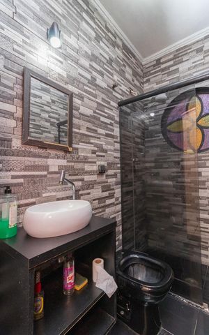 Casa à venda com 308m², 3 quartos e 2 vagasBanheiro 3