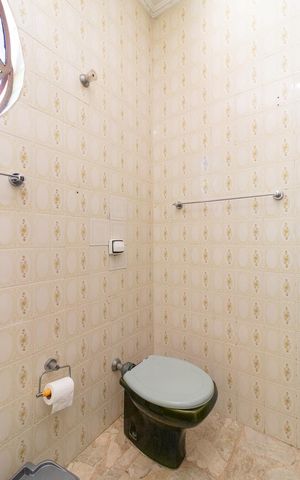 Casa à venda com 308m², 3 quartos e 2 vagasBanheiro 1 da Suíte