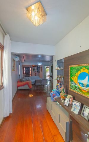 Casa à venda com 60m², 3 quartos e 2 vagas Casa à venda com 60m², 3 quartos e 2 vagasSala