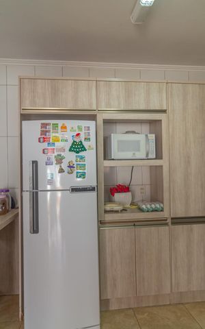 Casa à venda com 60m², 3 quartos e 2 vagas Casa à venda com 60m², 3 quartos e 2 vagasCozinha