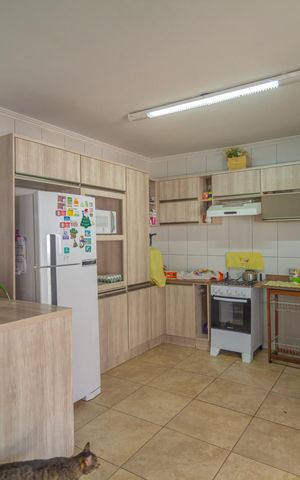 Casa à venda com 60m², 3 quartos e 2 vagas Casa à venda com 60m², 3 quartos e 2 vagasCozinha