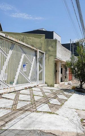 Casa à venda com 126m², 1 quarto e 2 vagasFachada + plaquinha