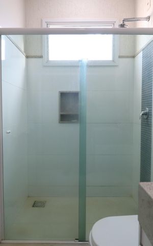 Casa de condomínio para alugar com 352m², 4 quartos e 2 vagasBanheiro da Suíte 3