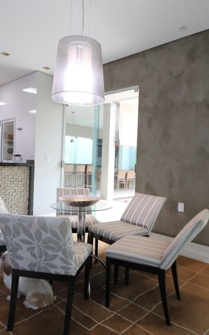 Casa de condomínio para alugar com 352m², 4 quartos e 2 vagasSala