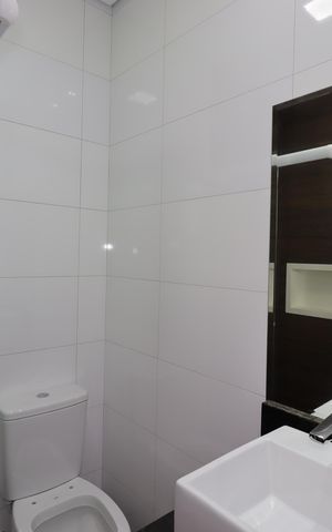 Casa à venda com 131m², 3 quartos e 4 vagasBanheiro da Suíte 1