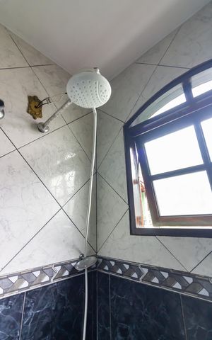 Casa à venda com 70m², 3 quartos e 2 vagas Casa à venda com 70m², 3 quartos e 2 vagasBanheiro 2