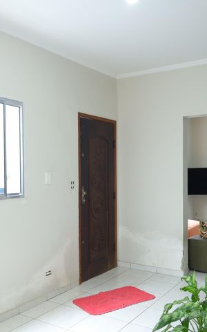 Casa à venda com 209m², 3 quartos e 2 vagasSala