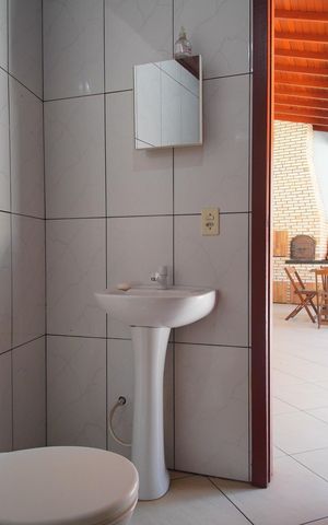 Casa à venda com 229m², 5 quartos e 3 vagasBanheiro 3