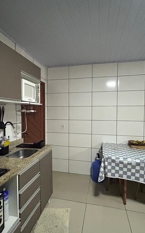 Casa à venda com 99m², 2 quartos e 3 vagas Casa à venda com 99m², 2 quartos e 3 vagasCozinha