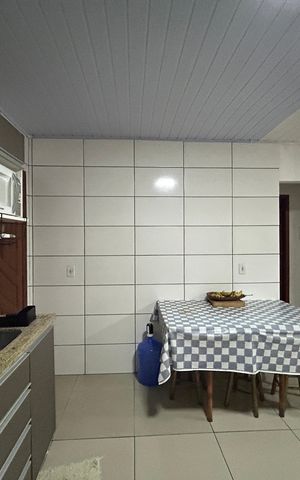 Casa à venda com 99m², 2 quartos e 3 vagas Casa à venda com 99m², 2 quartos e 3 vagasCozinha