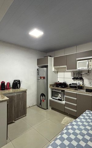 Casa à venda com 99m², 2 quartos e 3 vagas Casa à venda com 99m², 2 quartos e 3 vagasCozinha