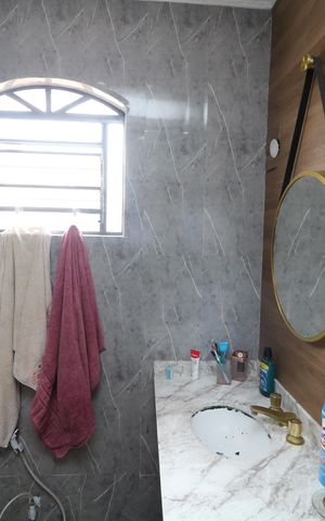 Casa à venda com 247m², 3 quartos e 2 vagasBanheiro da Suíte 2