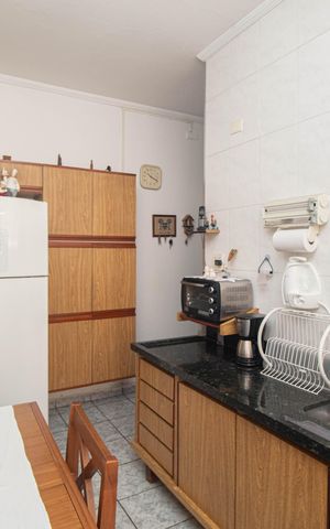 Casa à venda com 100m², 3 quartos e 1 vaga Casa à venda com 100m², 3 quartos e 1 vagaCozinha