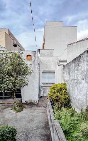 Casa à venda com 285m², 5 quartos e 6 vagasGaragem