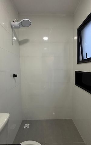 Casa à venda com 133m², 3 quartos e 2 vagas Casa à venda com 133m², 3 quartos e 2 vagasBanheiro da Suíte 2