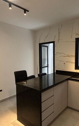 Casa à venda com 133m², 3 quartos e 2 vagas Casa à venda com 133m², 3 quartos e 2 vagasCozinha