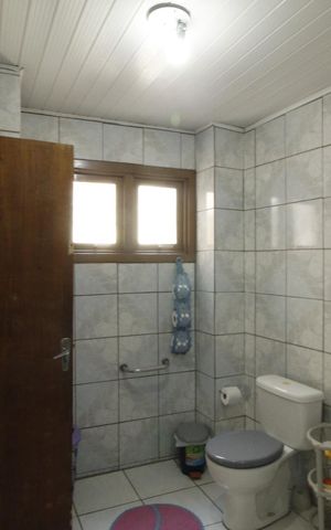Casa à venda com 242m², 5 quartos e 1 vagaBanheiro 1