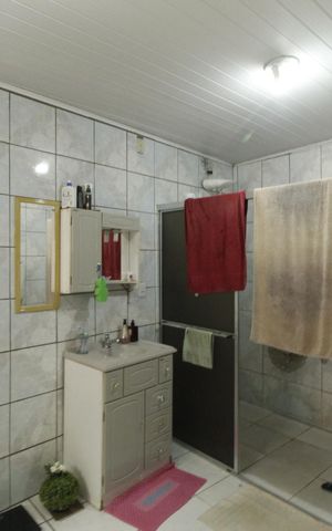Casa à venda com 242m², 5 quartos e 1 vagaBanheiro 1