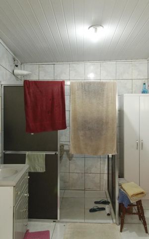 Casa à venda com 242m², 5 quartos e 1 vagaBanheiro 1