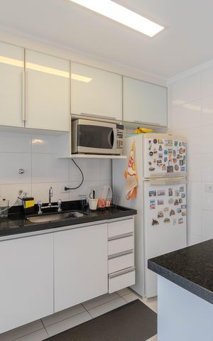Apartamento à venda com 55m², 2 quartos e 2 vagas Apartamento à venda com 55m², 2 quartos e 2 vagasCozinha