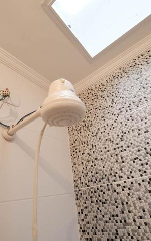 Casa à venda com 110m², 3 quartos e 2 vagasBanheiro