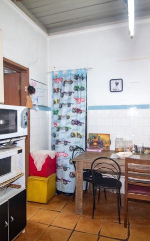 Casa à venda com 648m², 6 quartos e 3 vagas Casa à venda com 648m², 6 quartos e 3 vagasCozinha