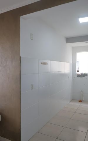 Apartamento para alugar com 49m², 2 quartos e 1 vagaCozinha e Área de Serviço