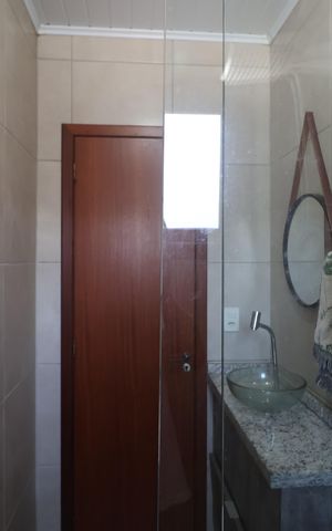 Casa à venda com 234m², 4 quartos e 2 vagasBanheiro