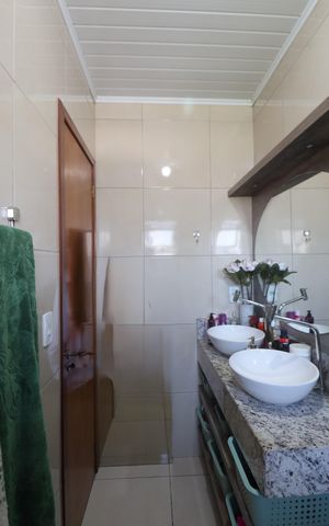 Casa à venda com 234m², 4 quartos e 2 vagasBanheiro da Suíte