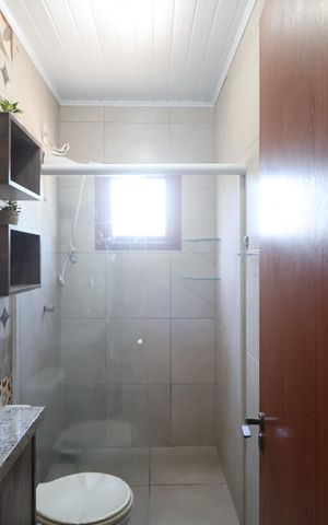 Casa à venda com 234m², 4 quartos e 2 vagasBanheiro