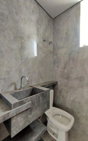 Casa à venda com 105m², 3 quartos e 3 vagas Casa à venda com 105m², 3 quartos e 3 vagasBanheiro