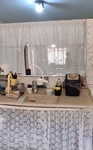 Casa à venda com 250m², 3 quartos e 2 vagas Casa à venda com 250m², 3 quartos e 2 vagasCozinha