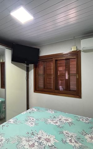 Casa à venda com 59m², 2 quartos e 2 vagas Casa à venda com 59m², 2 quartos e 2 vagasQuarto 2
