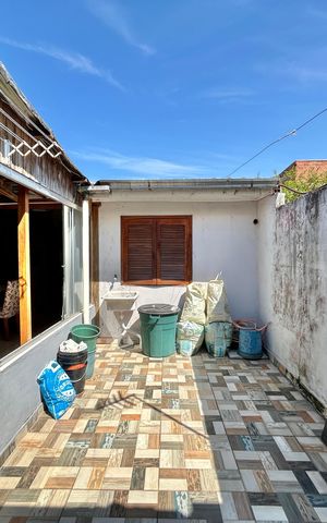 Casa à venda com 59m², 2 quartos e 2 vagas Casa à venda com 59m², 2 quartos e 2 vagasPátio