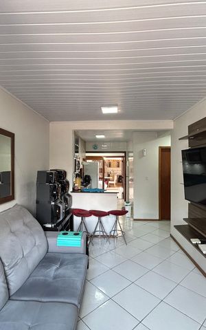 Casa à venda com 59m², 2 quartos e 2 vagas Casa à venda com 59m², 2 quartos e 2 vagasSala