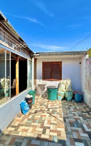 Casa à venda com 59m², 2 quartos e 2 vagas Casa à venda com 59m², 2 quartos e 2 vagasPátio