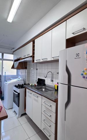 Apartamento à venda com 59m², 2 quartos e 1 vaga Apartamento à venda com 59m², 2 quartos e 1 vagaCozinha e Área de Serviço