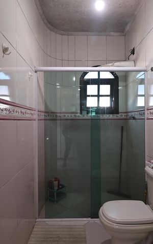Casa à venda com 230m², 4 quartos e 2 vagasBanheiro da Suíte 2