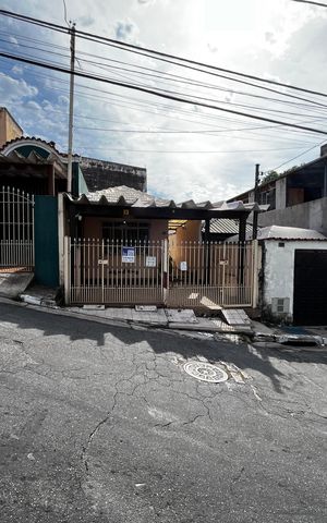 Casa à venda com 125m², 3 quartos e 2 vagas Casa à venda com 125m², 3 quartos e 2 vagasFachada/Placa